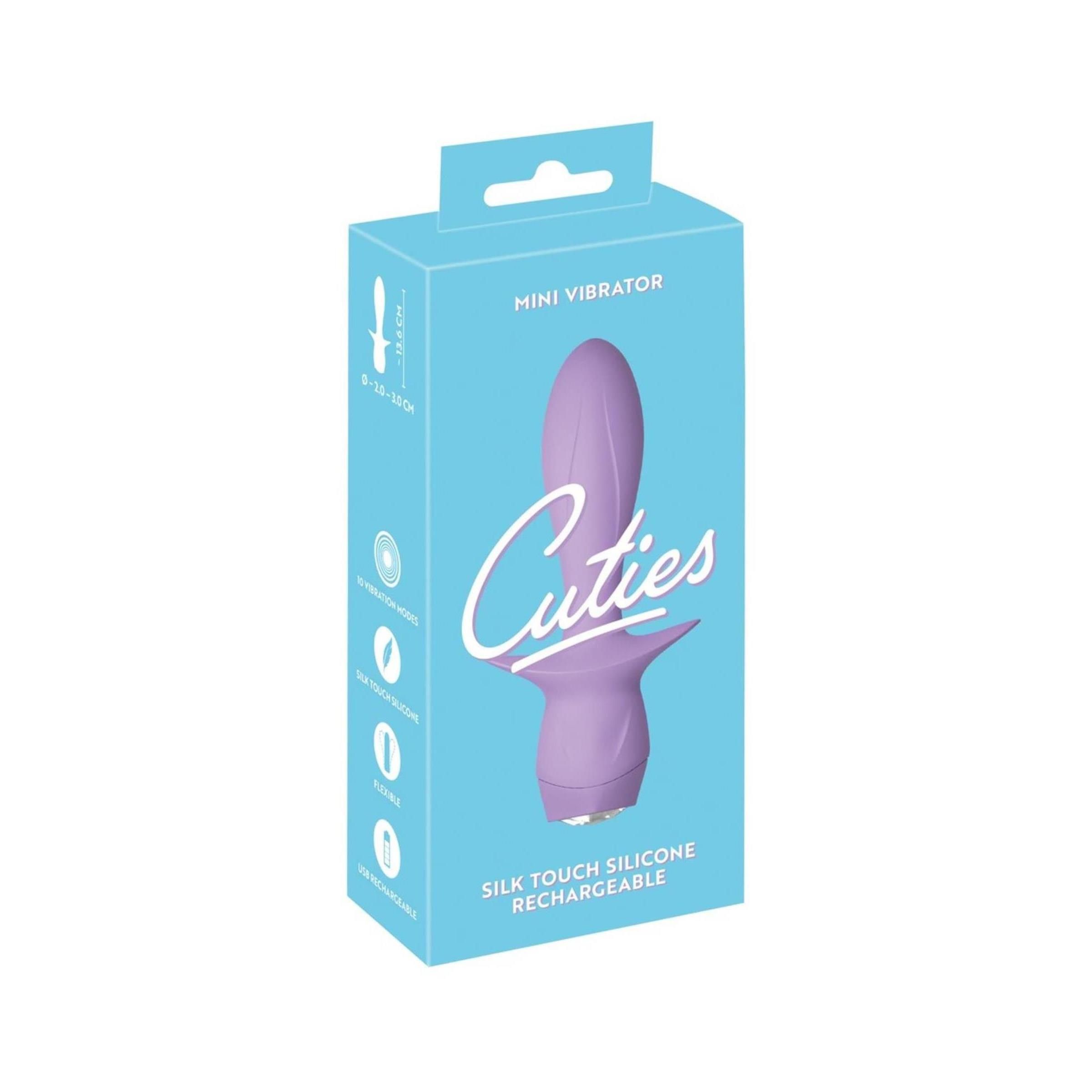 Lila Mini-Vibrator in hellblauer Verpackung. Produktname: Cuties. Text: Silk Touch Silicone, Rechargeable.