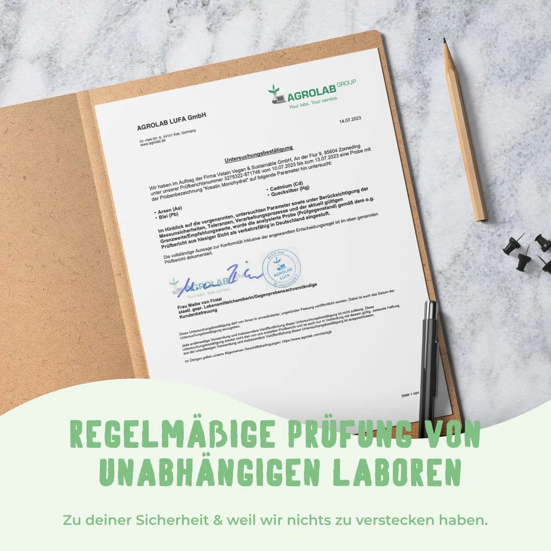 Dokument mit Logo "AGROLAB GROUP". Text: "Regelmäßige Prüfung von unabhängigen Laboren". Stifte und Büroklammern.