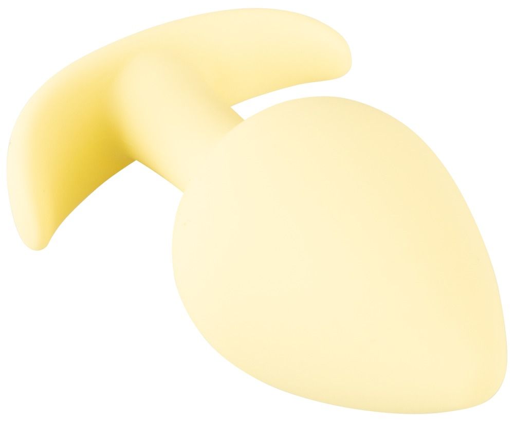 Gelber Analplug mit tropfenförmigem Kopf und gebogener Basis. Draufsicht.