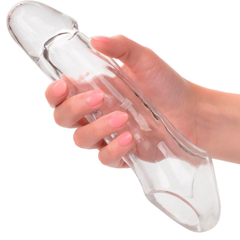 Transparente Penisverlängerung, in Hand gehalten, mit abgerundeter Spitze.