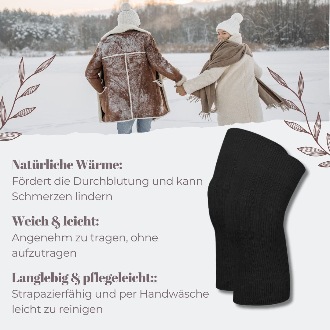 Schwarze Angora-Kniewärmer. Geripptes Material. Hintergrund: verschneite Landschaft mit Personen.