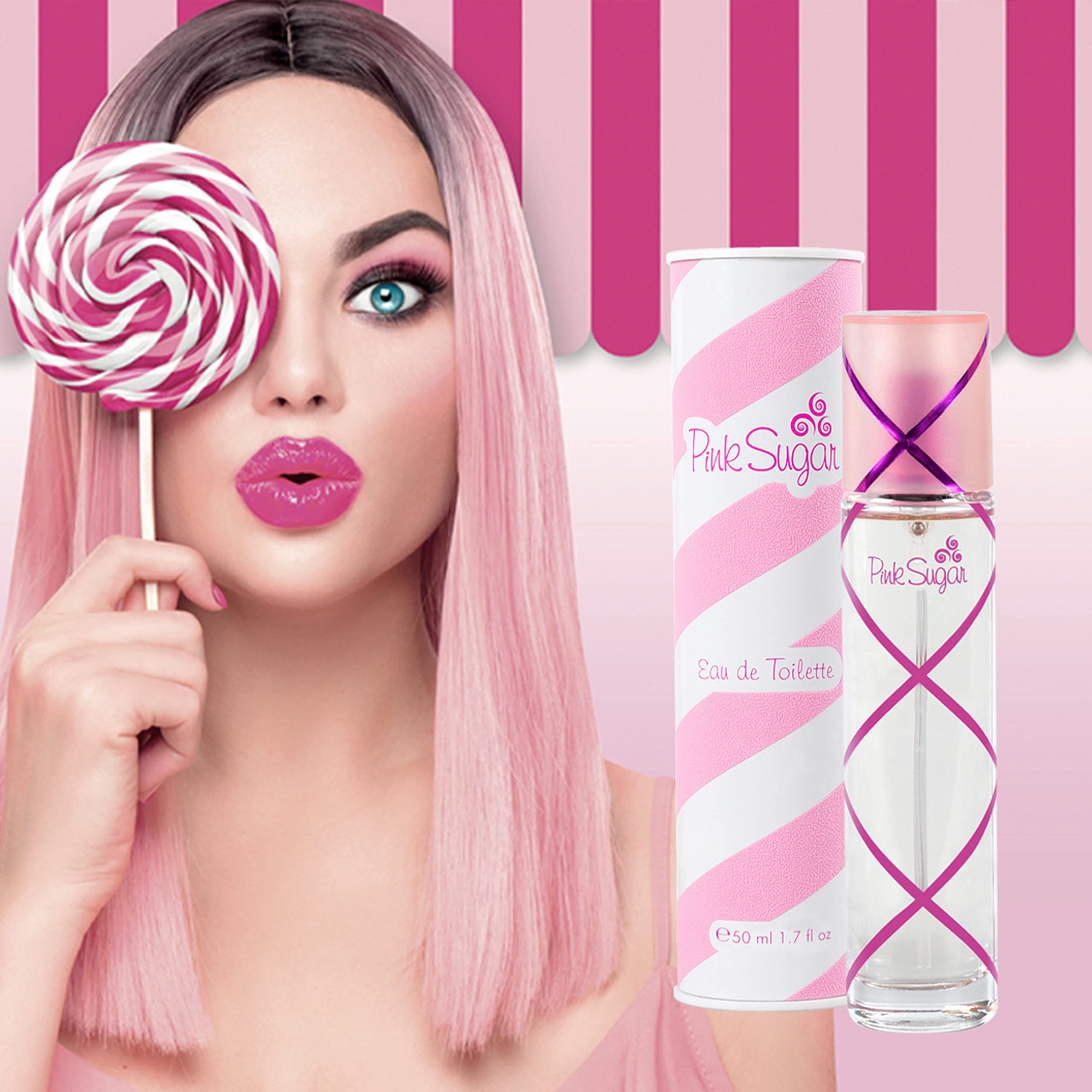 Frau mit rosa Haaren und Lutscher. Neben ihr: Parfümflasche mit rosa Akzenten und Schriftzug Pink Sugar.