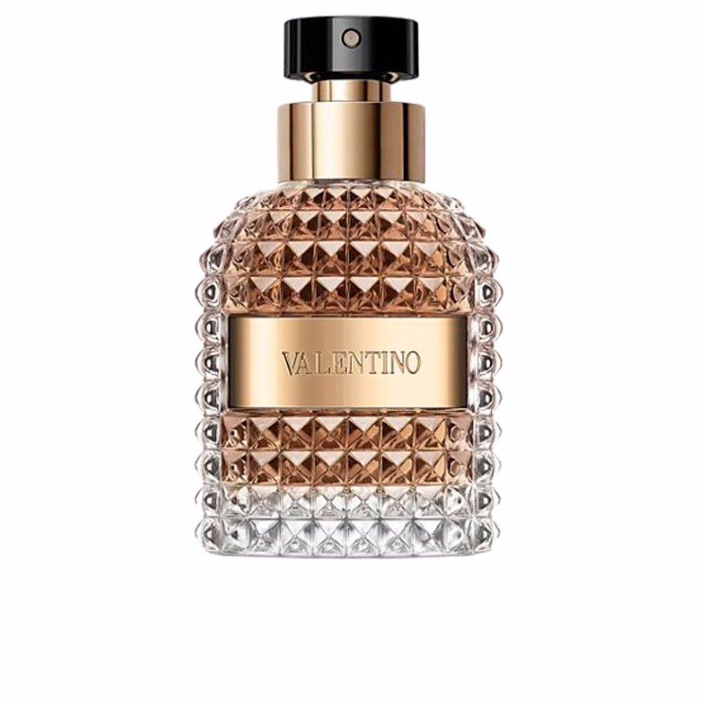 Valentino Uomo Eau de Toilette. Flakon mit goldfarbenem Verschluss und Label. Glasflakon mit Prägung.