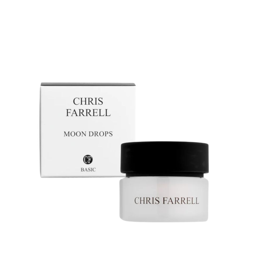 Cremebehälter und Verpackung. Aufschrift: CHRIS FARRELL, MOON DROPS, BASIC. Behälter mit schwarzem Deckel, Verpackung weiß.