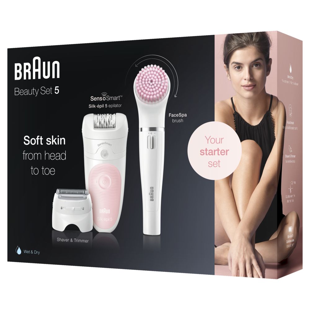 Braun Beauty Set 5. Epilierer, Gesichtsbürste und Trimmer. Verpackung. Weiß, rosa und schwarz. Text: Soft skin from head to toe.