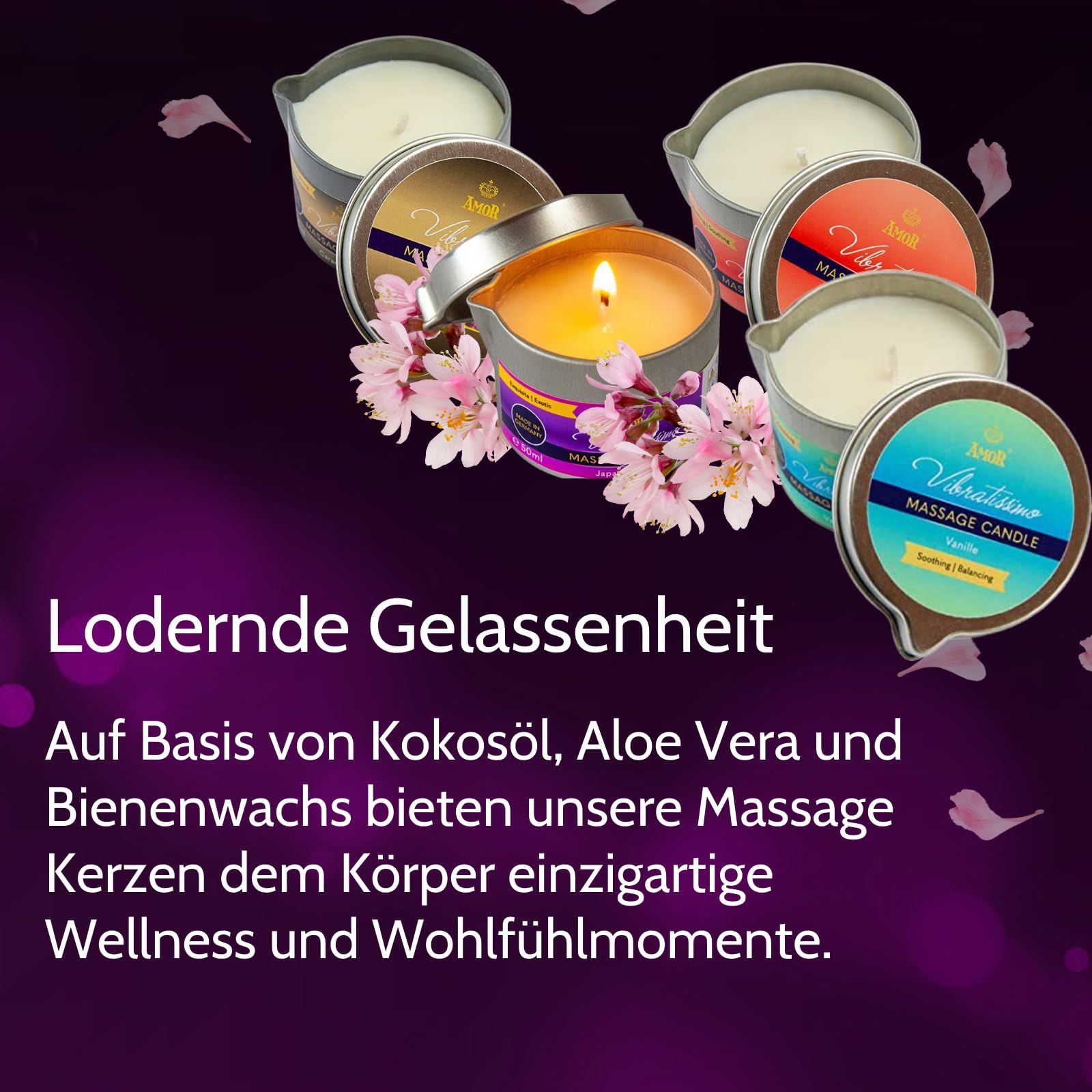 Mehrere Massagekerzen in Dosen, eine davon angezündet, mit Kirschblüten dekoriert.