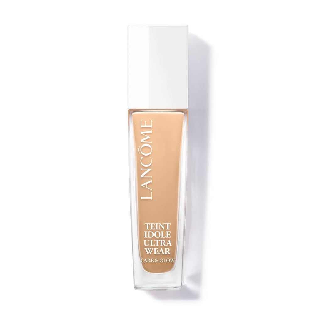 Flakon mit beigem Make-up. Weißer Deckel. Schriftzug: Lancôme, Teint Idole Ultra Wear Care & Glow.