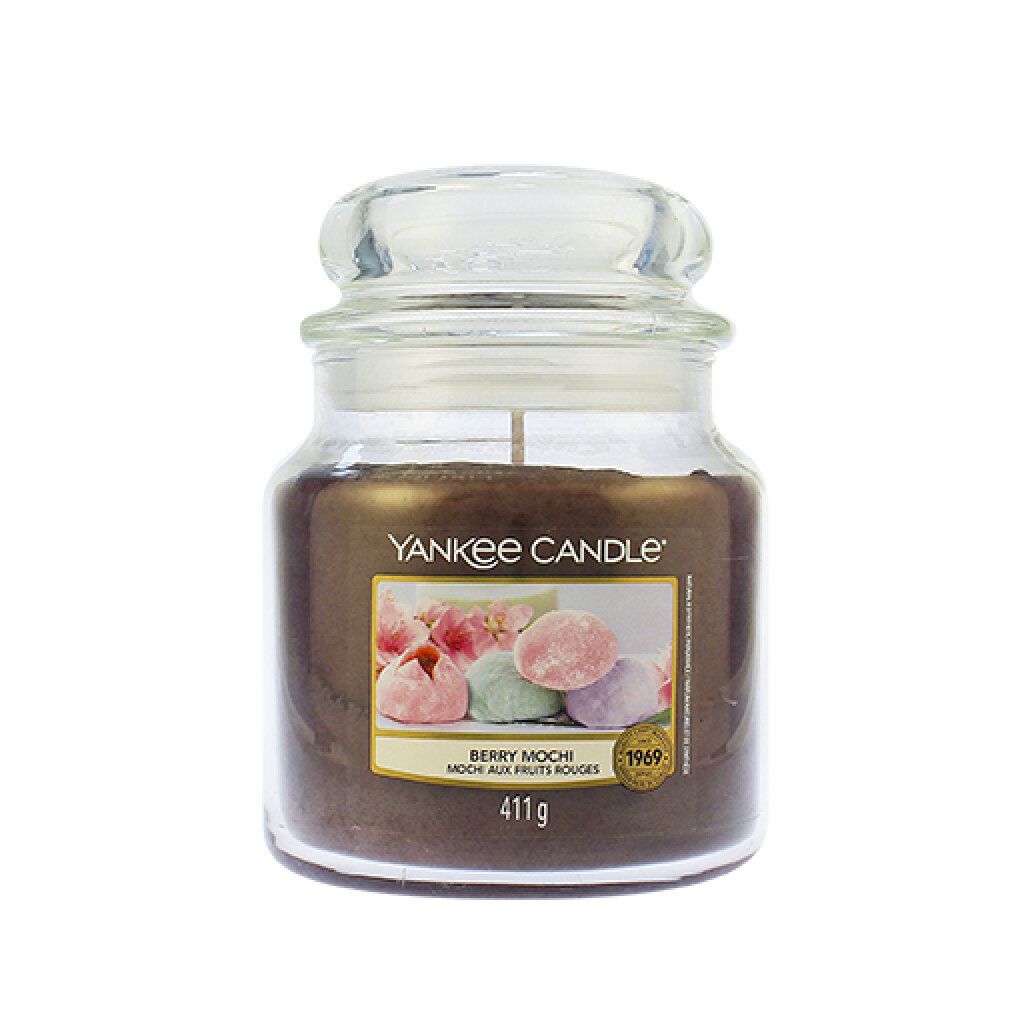 Duftkerze im Glas mit Deckel. Aufkleber mit Mochi-Abbildung und Schriftzug. Gewicht: 411g. Marke Yankee Candle.