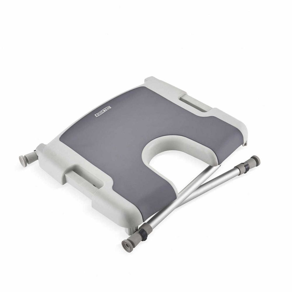 Duschstuhl mit Hygieneausschnitt, grau und weiß. Zerlegt, mit zwei Beinen. Marke Aquatec® sichtbar.