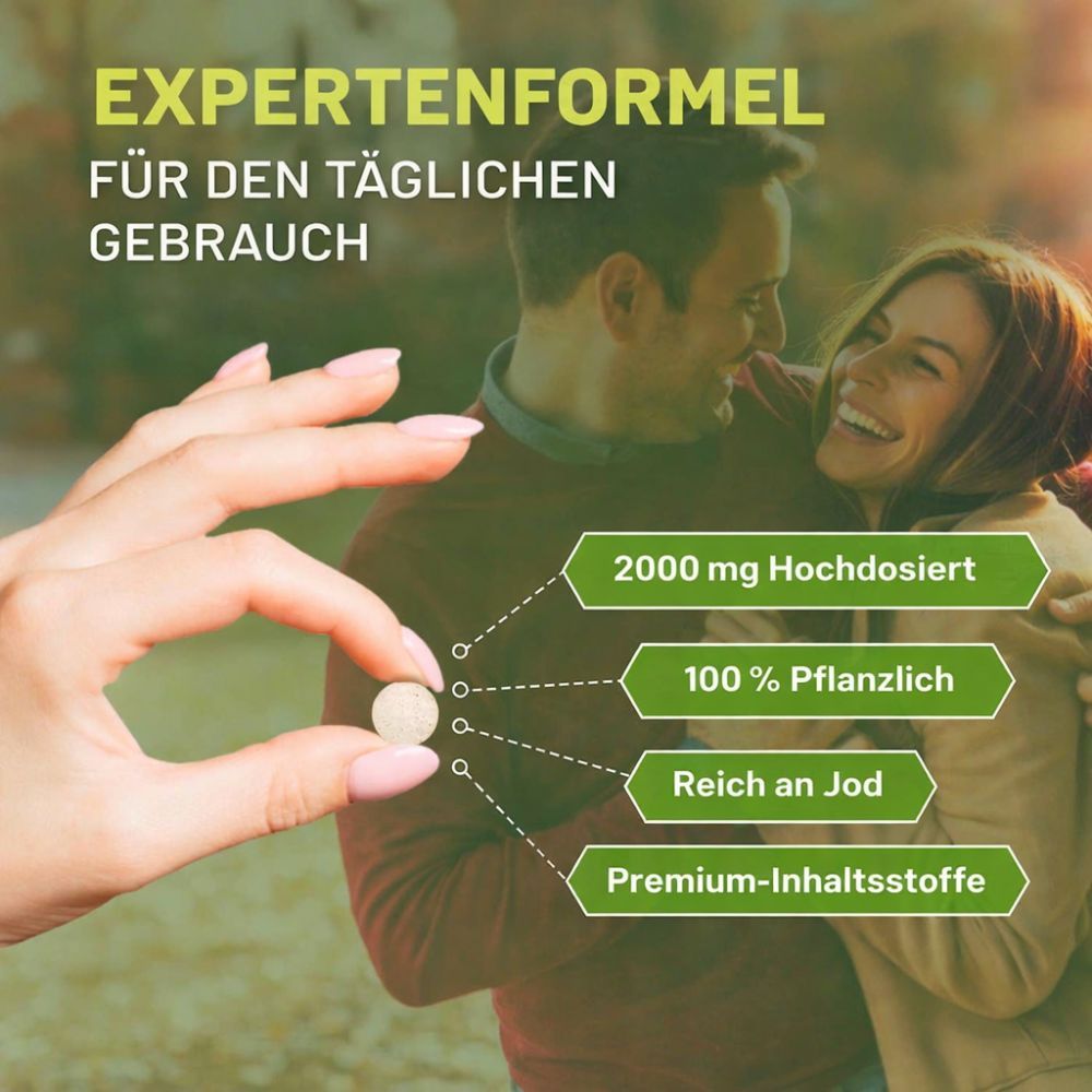 Nahaufnahme einer Hand, die eine Tablette hält. Text: 2000 mg hochdosiert, 100% pflanzlich, reich an Jod, Premium-Inhaltsstoffe.