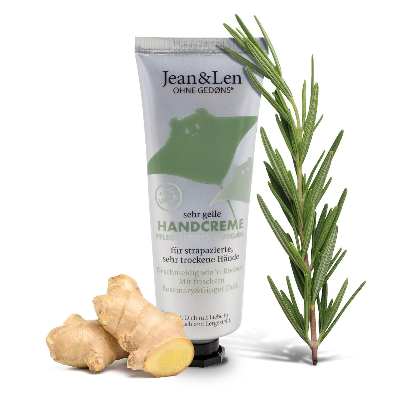 Handcreme-Tube, Rosmarin- und Ingwer-Zweig, Ingwerwurzeln. Aufschrift: Jean & Len, sehr geile Handcreme, vegan.