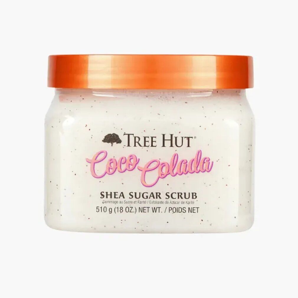 Tree Hut Coco Colada Shea Sugar Scrub in einem durchsichtigen Behälter mit orangefarbenem Deckel.