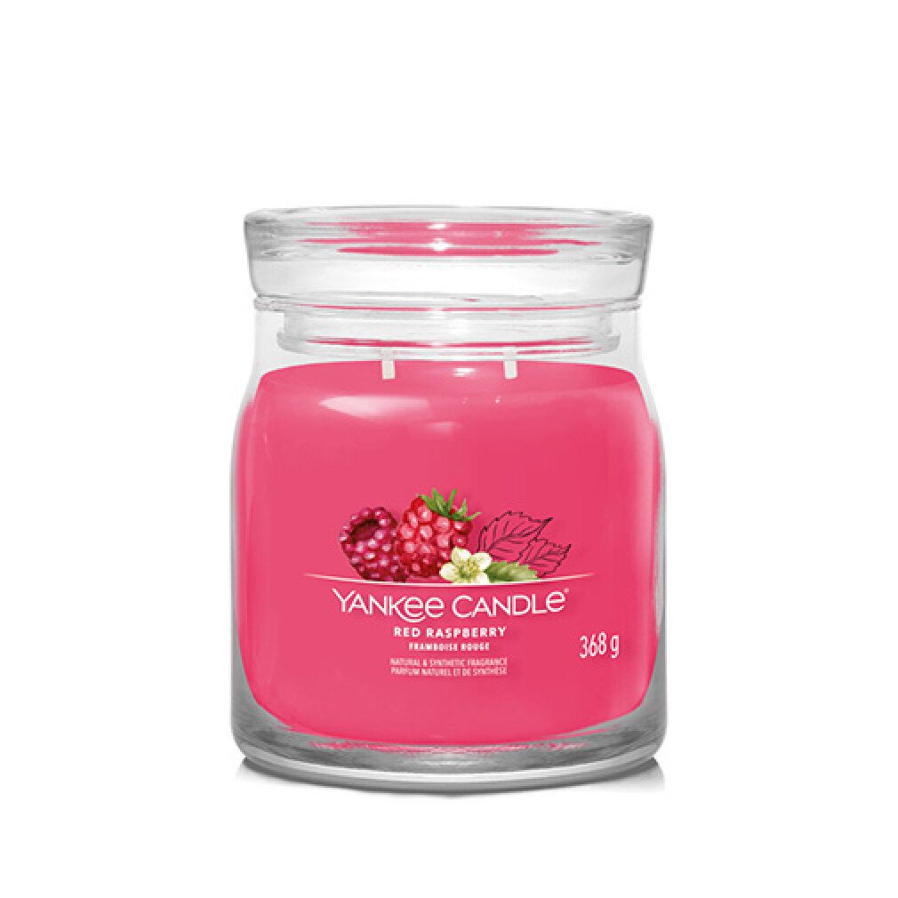 Rote Kerze im Glas. Aufschrift: Red Raspberry, 368g. Abbildung von Himbeeren und Blättern.