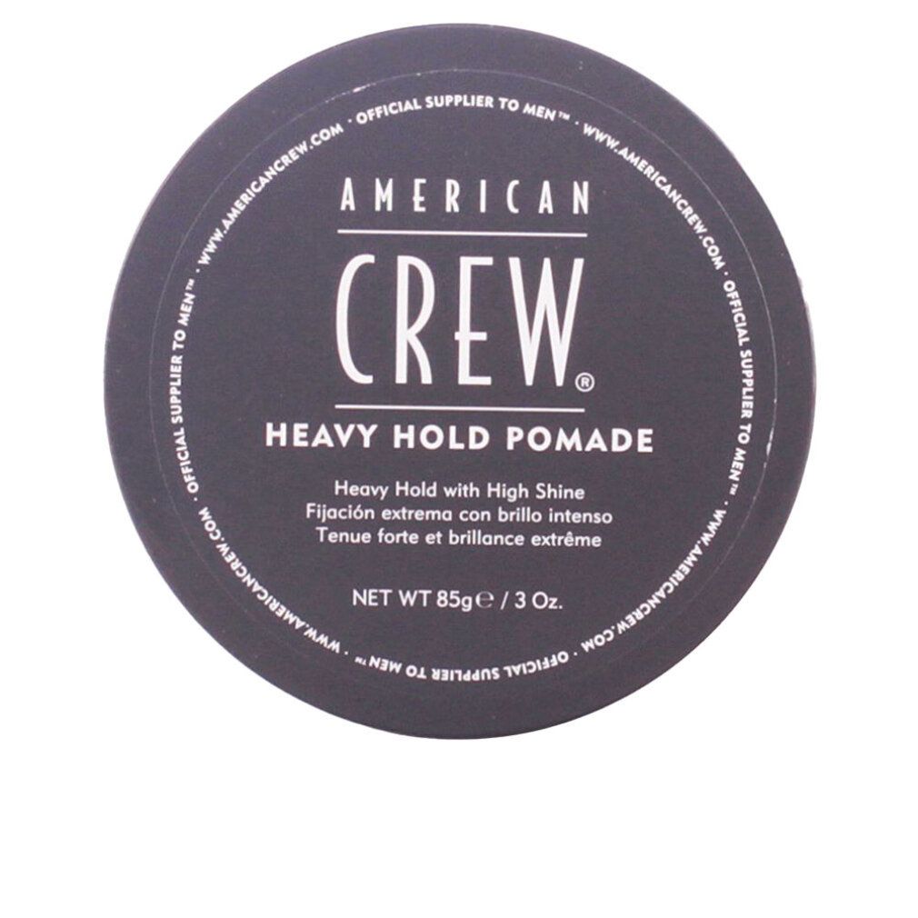 Schwarzer Deckel mit Aufschrift: AMERICAN CREW, HEAVY HOLD POMADE. Runde Form, Produktname und Text deutlich sichtbar.
