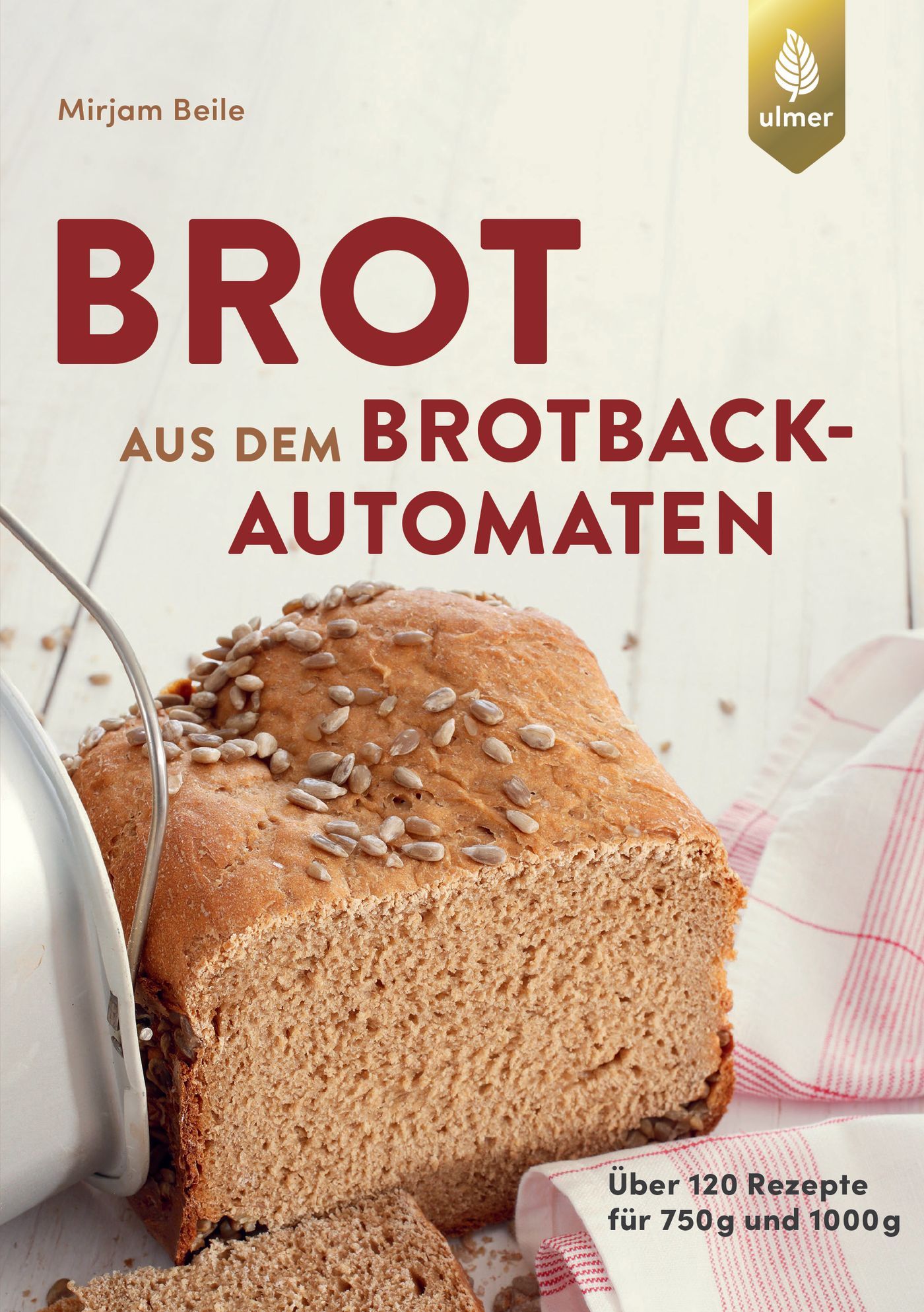Buchcover mit Brot. Titel: Brot aus dem Brotbackautomaten. Autor: Mirjam Beile. Logo Ulmer. Über 120 Rezepte für 750g und 1000g.