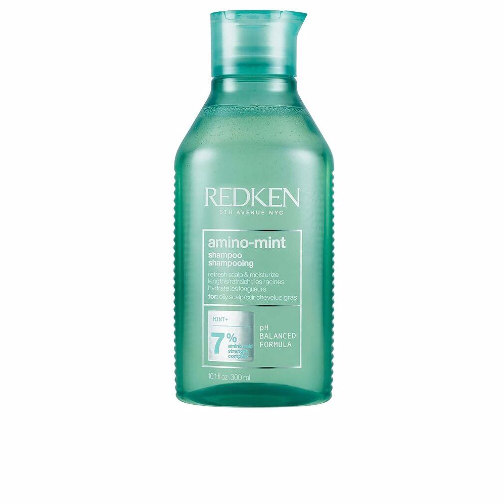 Grüne Redken Amino Mint Shampoo Flasche. Enthält Text: Shampoo, pH-ausgewogene Formel, 7%.