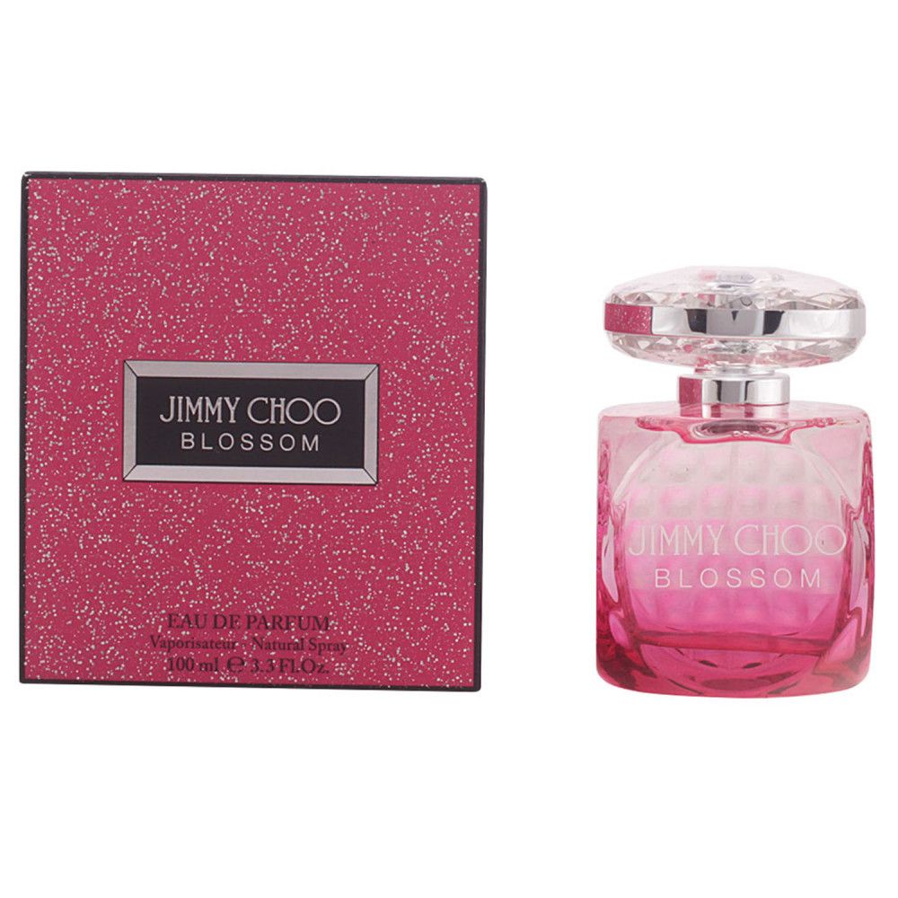Flakon und Verpackung. Flakon mit rosa Flüssigkeit. Verpackung mit Glitzereffekt. Aufschrift "JIMMY CHOO BLOSSOM".