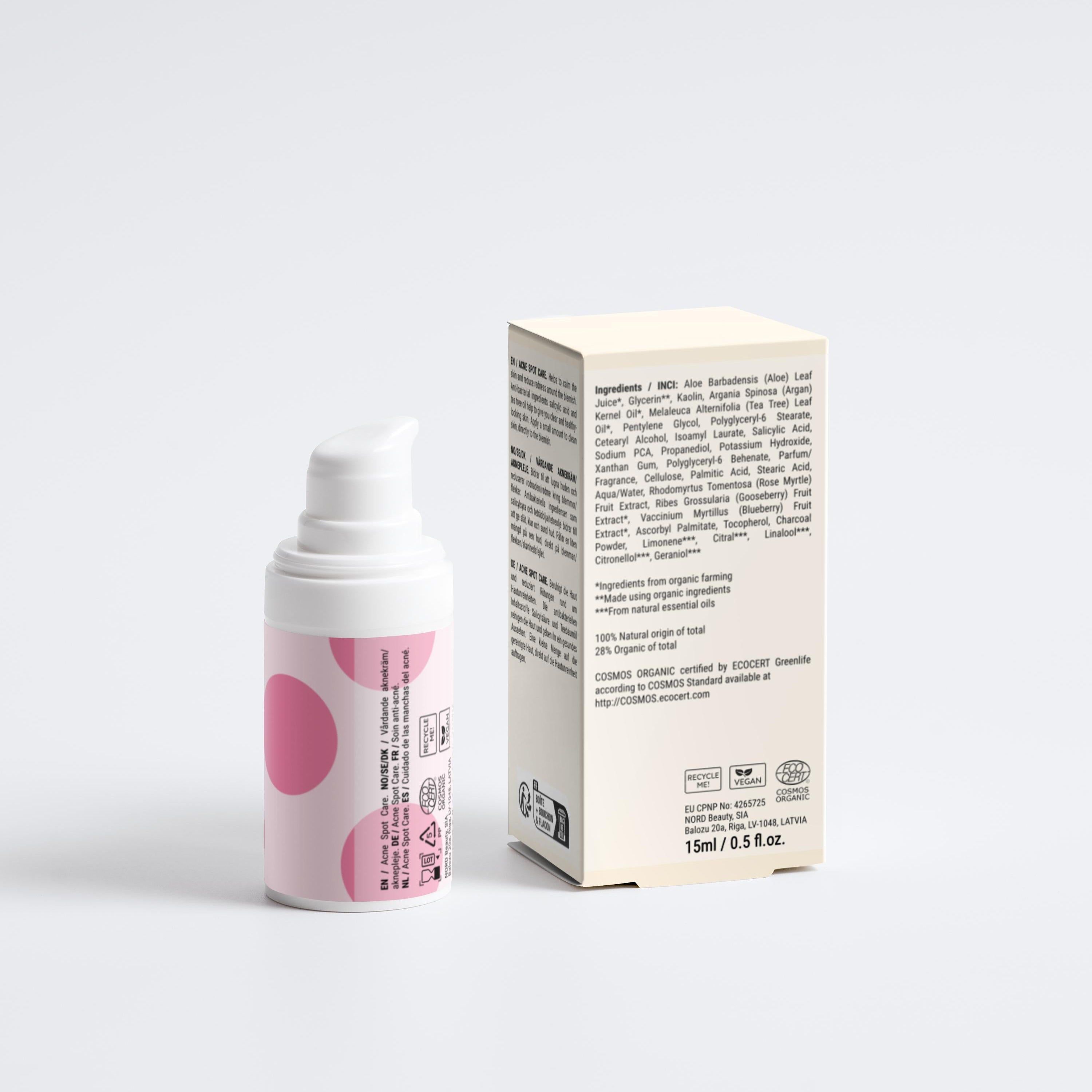 Weiße Pumpeflasche mit rosa Punkten und Kartonverpackung daneben.