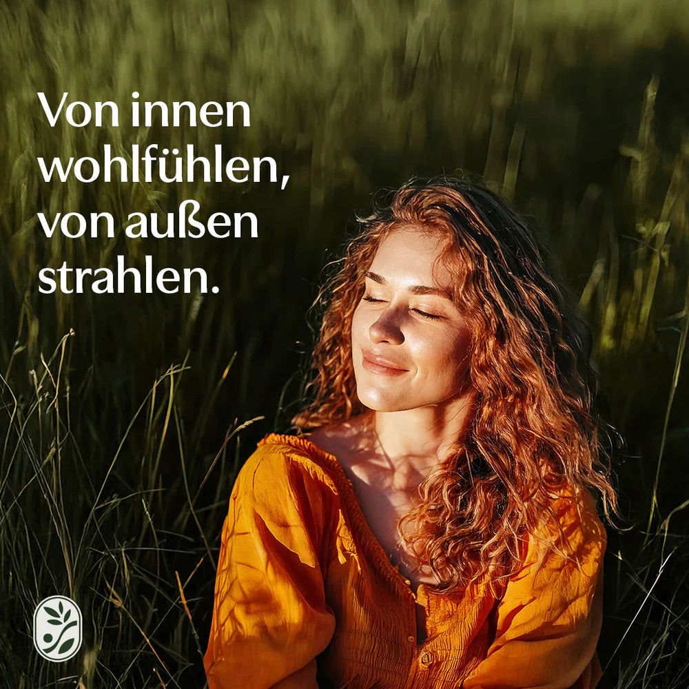 Frau mit geschlossenen Augen in einem Feld. Text: "Von innen wohlfühlen, von außen strahlen."