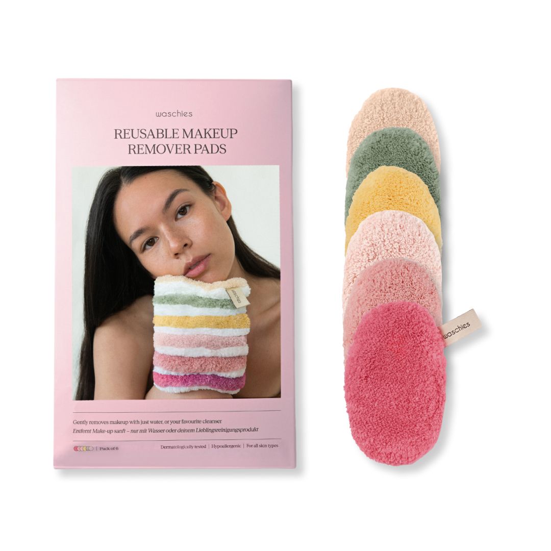 Rosa Verpackung mit Text und Frau. Daneben 6 farbige Abschminkpads. Pads in verschiedenen Farben, oval.