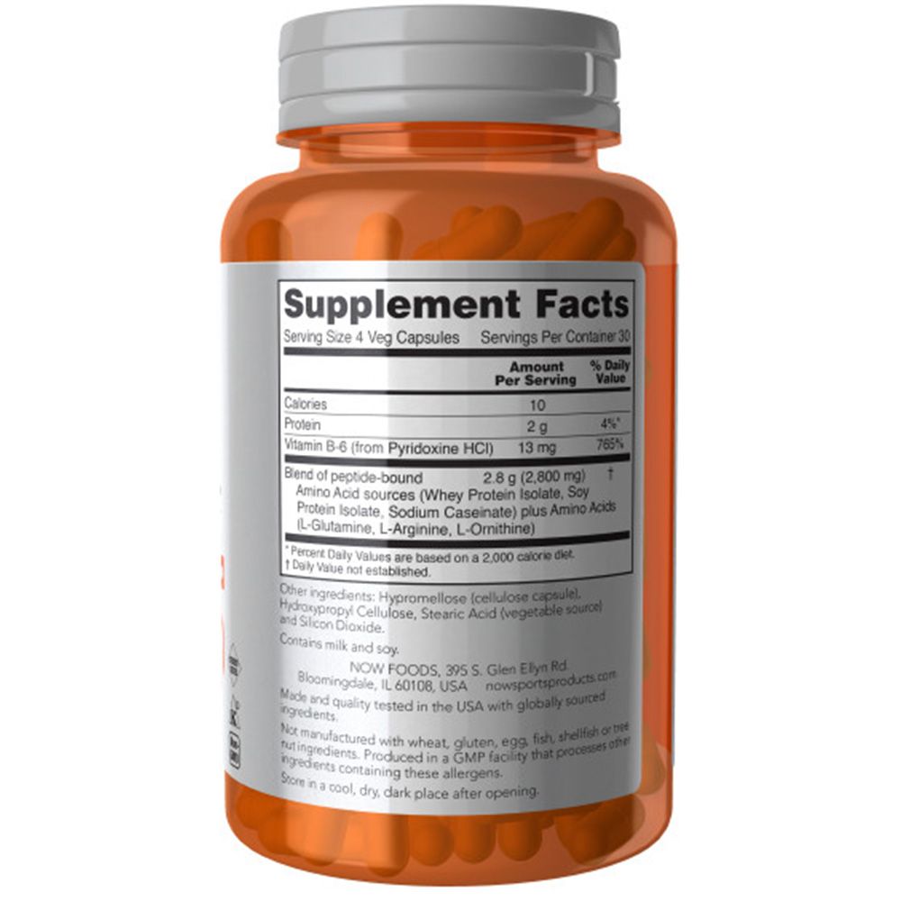 Braune Kapseln in einer orangefarbenen Flasche. Aufkleber mit Nährwertangaben und Inhaltsstoffen. Enthält Vitamin B-6 und Aminosäuren.