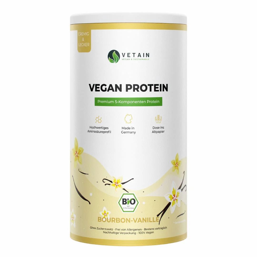 Zylindrische Dose mit "VETAIN VEGAN PROTEIN". Aufschrift "Bourbon-Vanille" und Bio-Siegel. Goldener Deckel und Schriftzug.