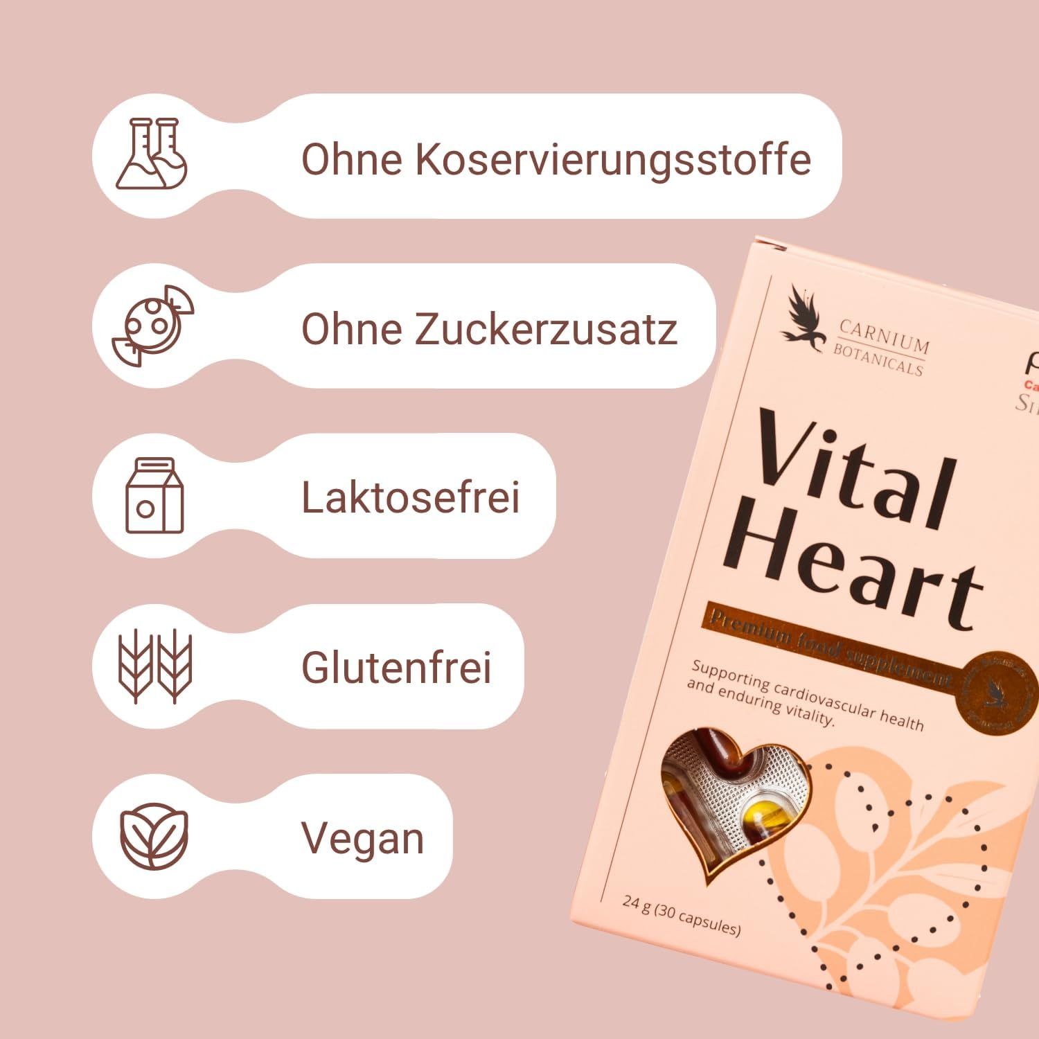 Rosa Schachtel "Vital Heart" mit Logos und Text. Aufschrift: Ohne Konservierungsstoffe, Zuckerzusatz, laktosefrei, glutenfrei, vegan.