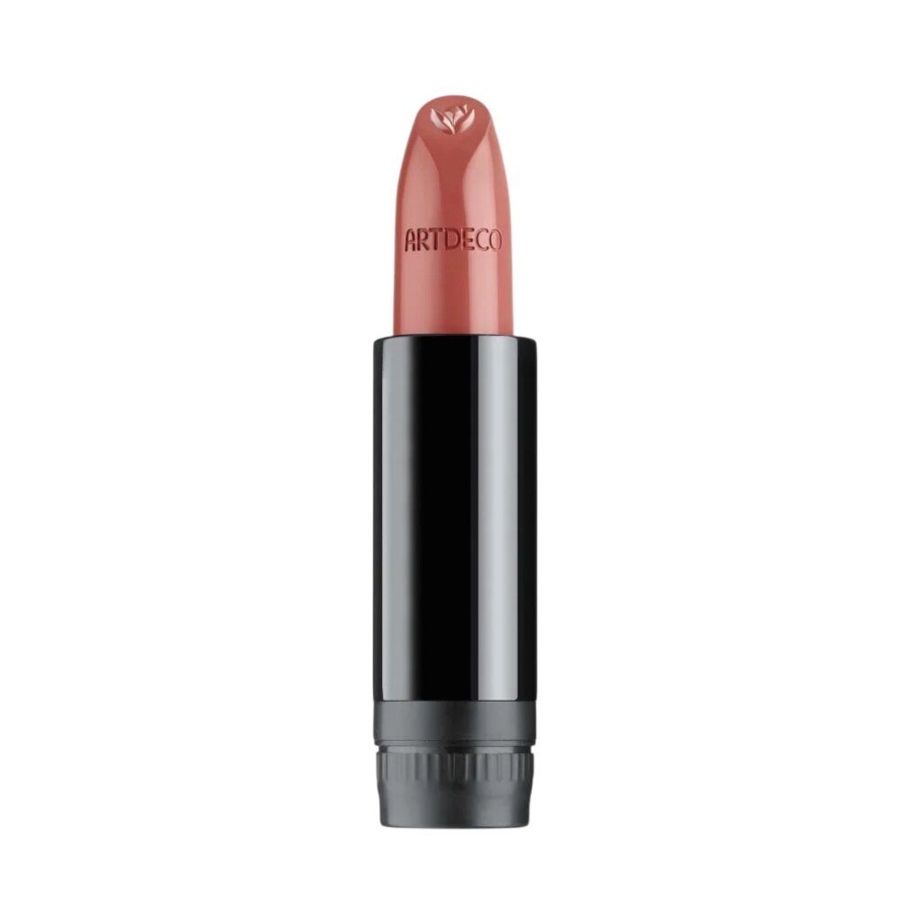Ein ARTDECO Lippenstift in einem glänzenden schwarzen Gehäuse mit einem rosafarbenen Stift.