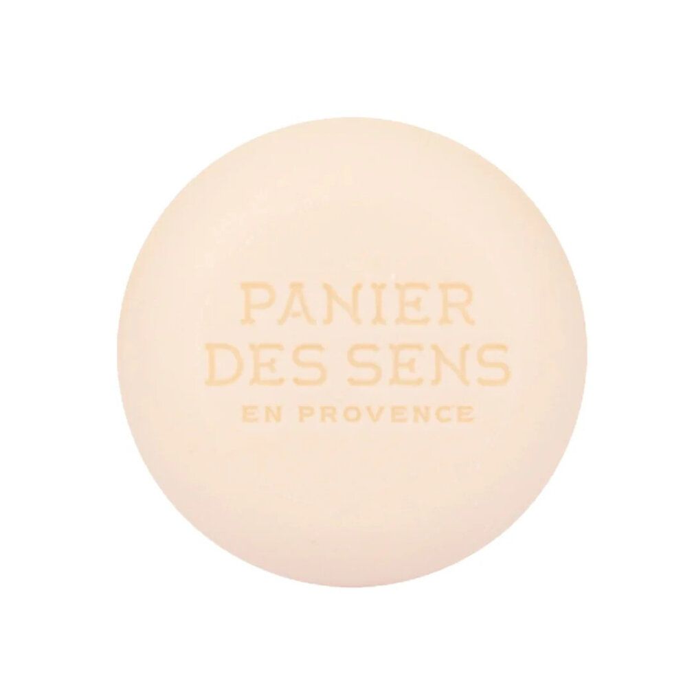 Rundes, festes Shampoo. Aufschrift: Panier des Sens. Farbe: weiß.