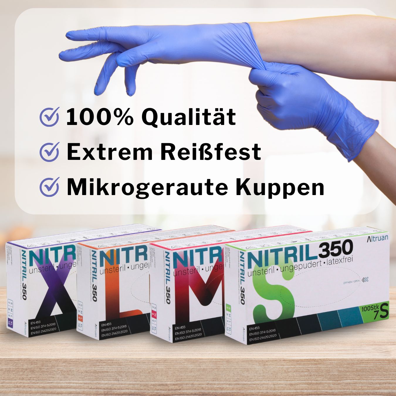 Handschuhe in verschiedenen Größen: XL, L, M, S. Aufdruck: Nitril 350, unsteril, ungepudert, latexfrei. Handschuhe werden getragen.