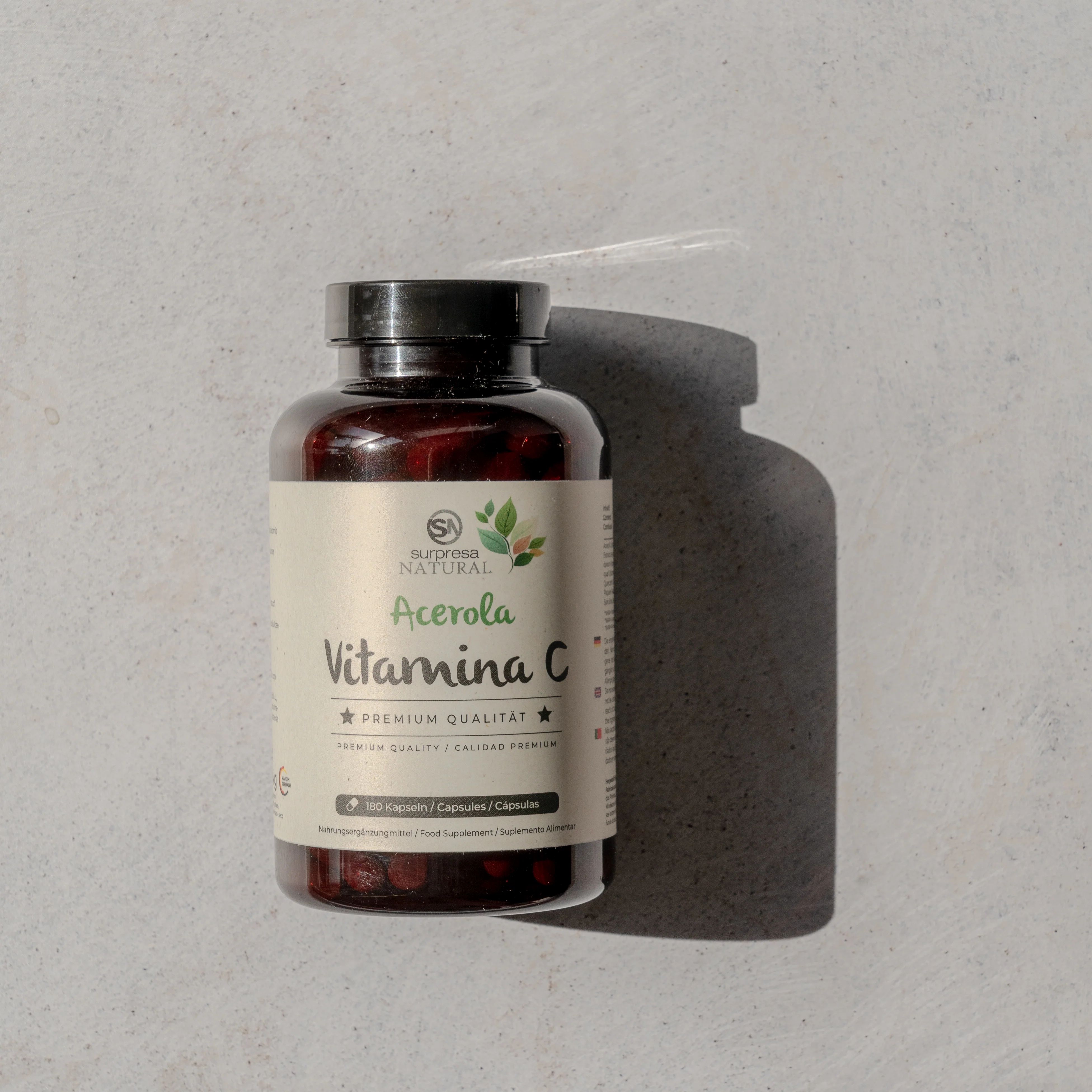 Braune Flasche mit weißem Etikett. Aufschrift: Acerola Vitamin C. 180 Kapseln. Premium Qualität.