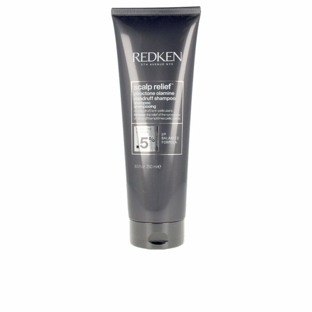 Dunkelgraue Tube mit Produktinformationen. Aufschrift: Redken, Scalp Relief, 0,5% Pirocton Olamin, pH-ausgeglichen.