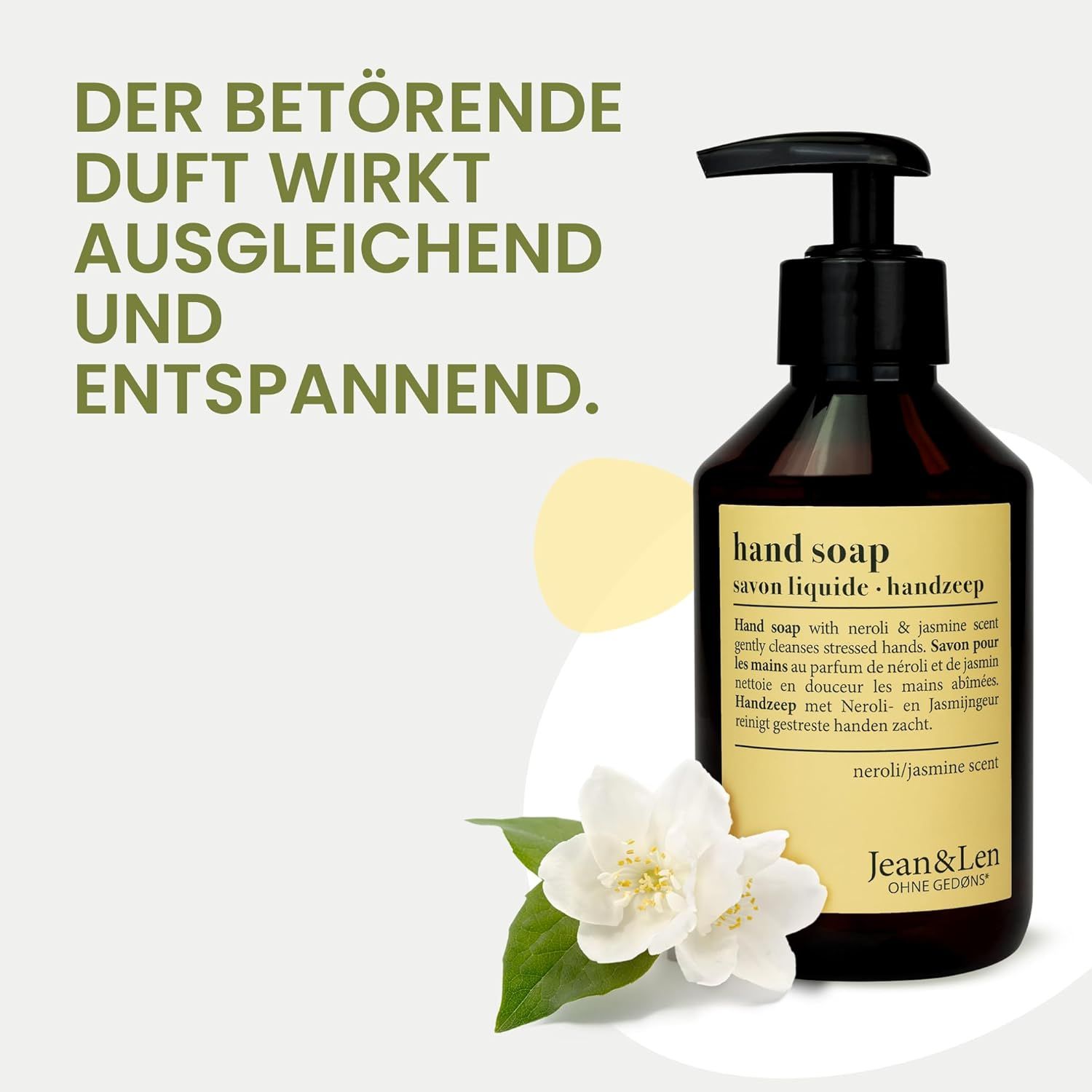 Braune Flasche Handseife mit schwarzem Pumpkopf. Beschriftung: Hand Soap, Neroli & Jasmin Duft, Jean & Len. Mit Jasminblüte.
