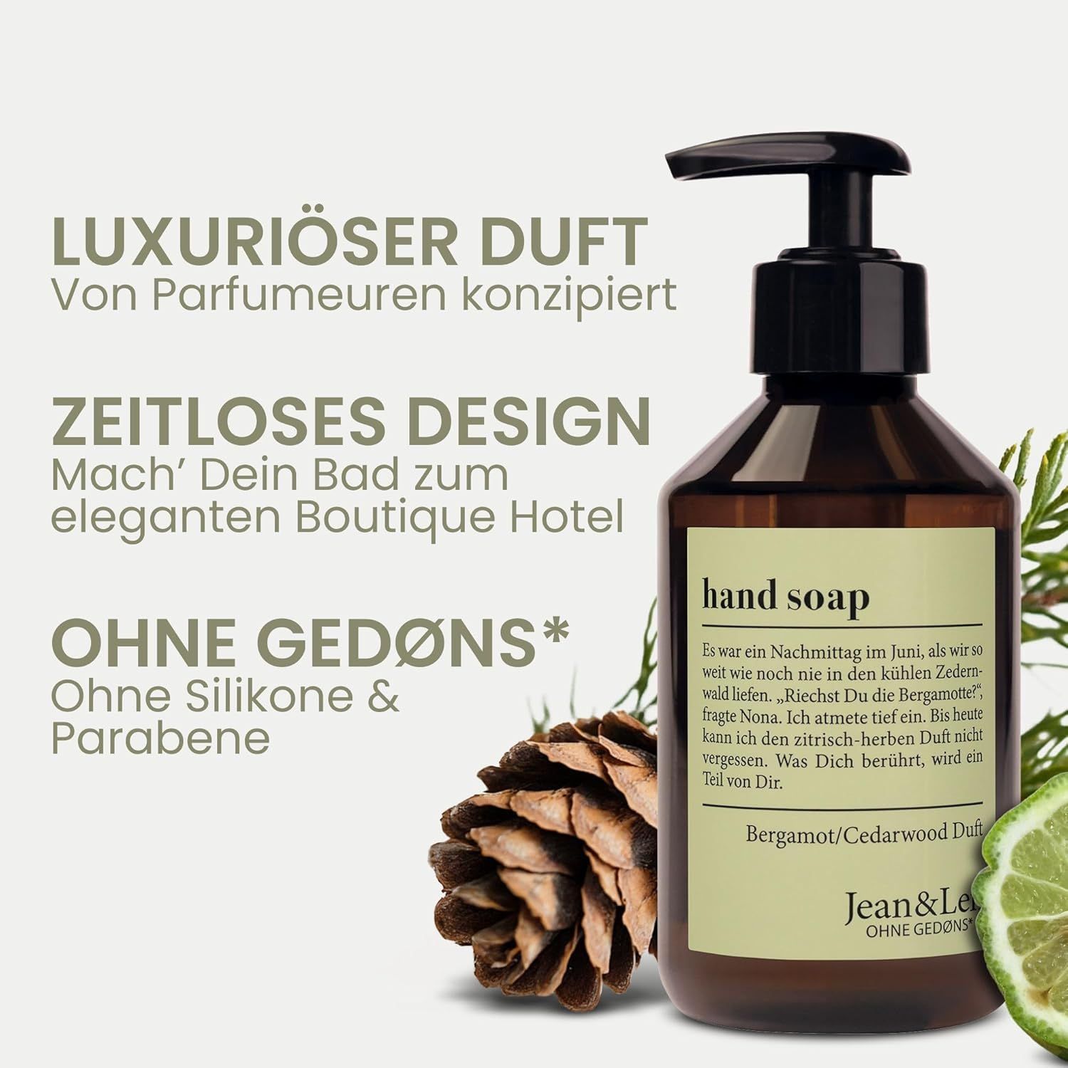 Braune Flasche mit schwarzem Pumpkopf. Aufschrift: hand soap, Bergamot/Cedarwood Duft. Jean & Len Logo. Tannenzapfen und Zweig.