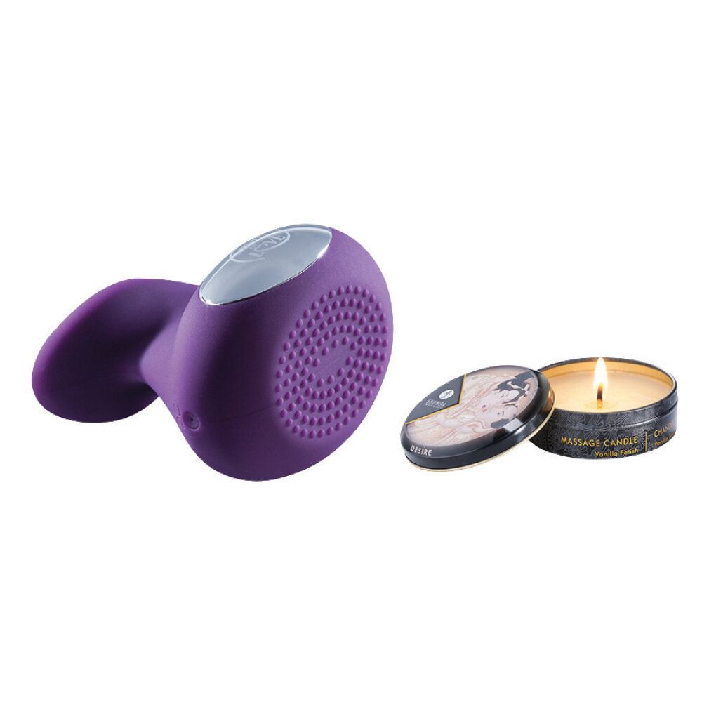 Lila Massagegerät, eine brennende Kerze und eine Kerze mit Deckel. Keine Verpackung sichtbar.