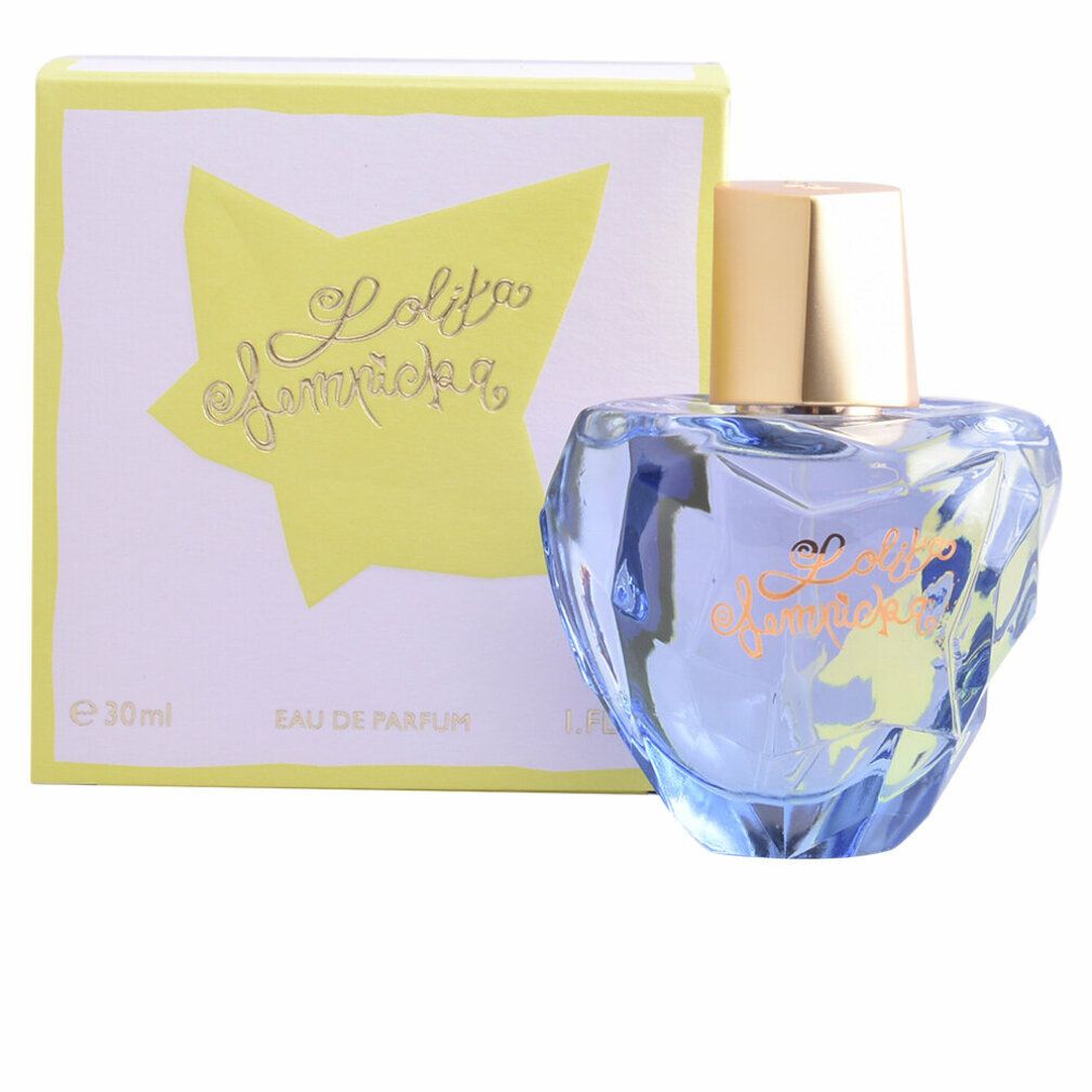 Lolita Lempicka Eau de Parfum Flakon und Schachtel. Blauer Flakon, goldener Deckel. Gelbe Stern-Schachtel.