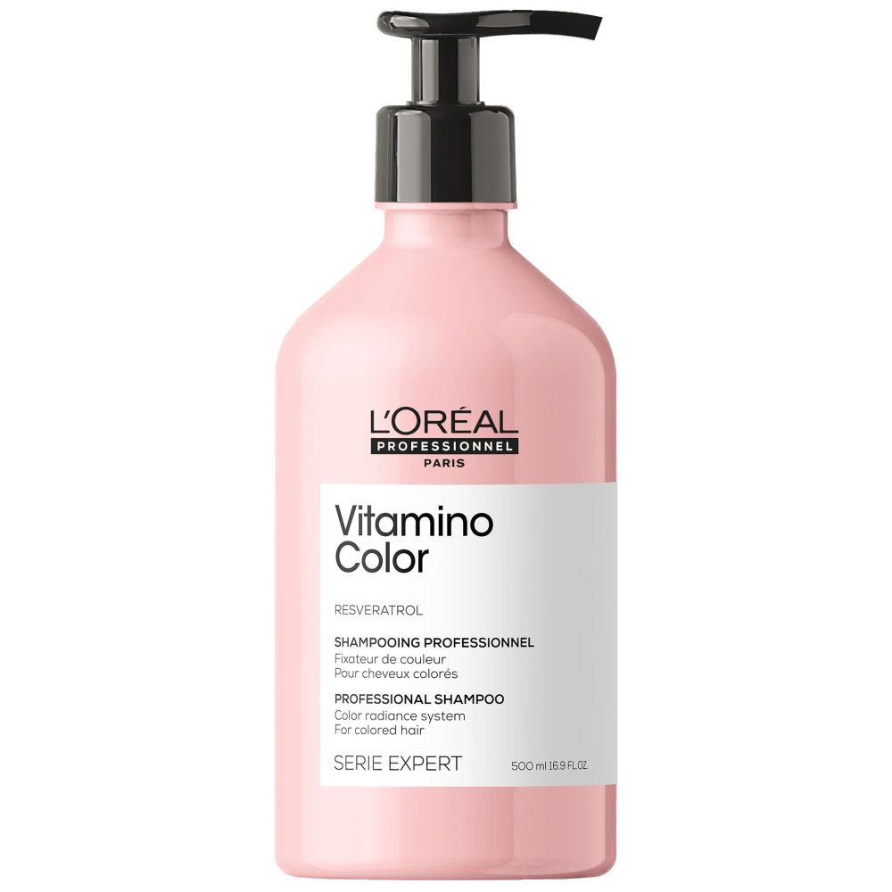 Rosa Shampoo-Flasche mit schwarzem Pumpkopf. L'Oréal Vitamino Color. Text: Resveratrol, Shampooing Professionnel, 500 ml.