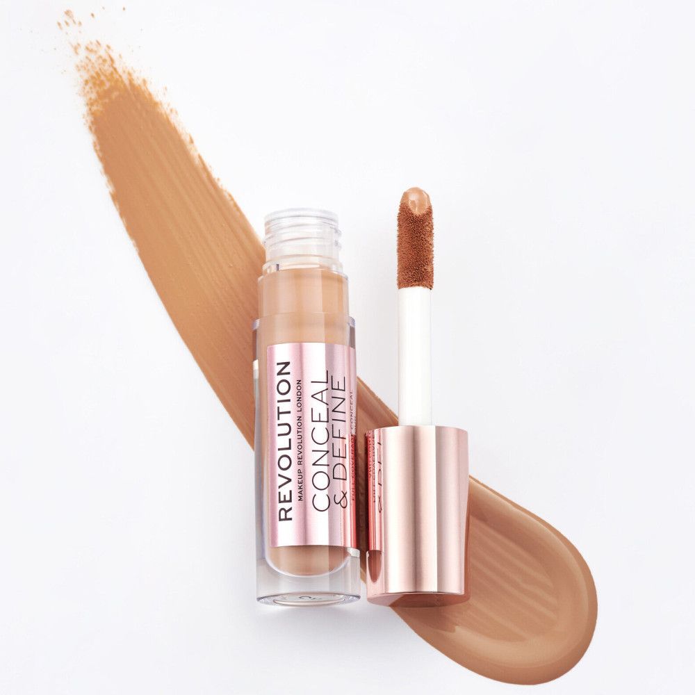 Concealer-Fläschchen mit Applikator. Rosegoldener Deckel, transparente Flasche, Produktname sichtbar.
