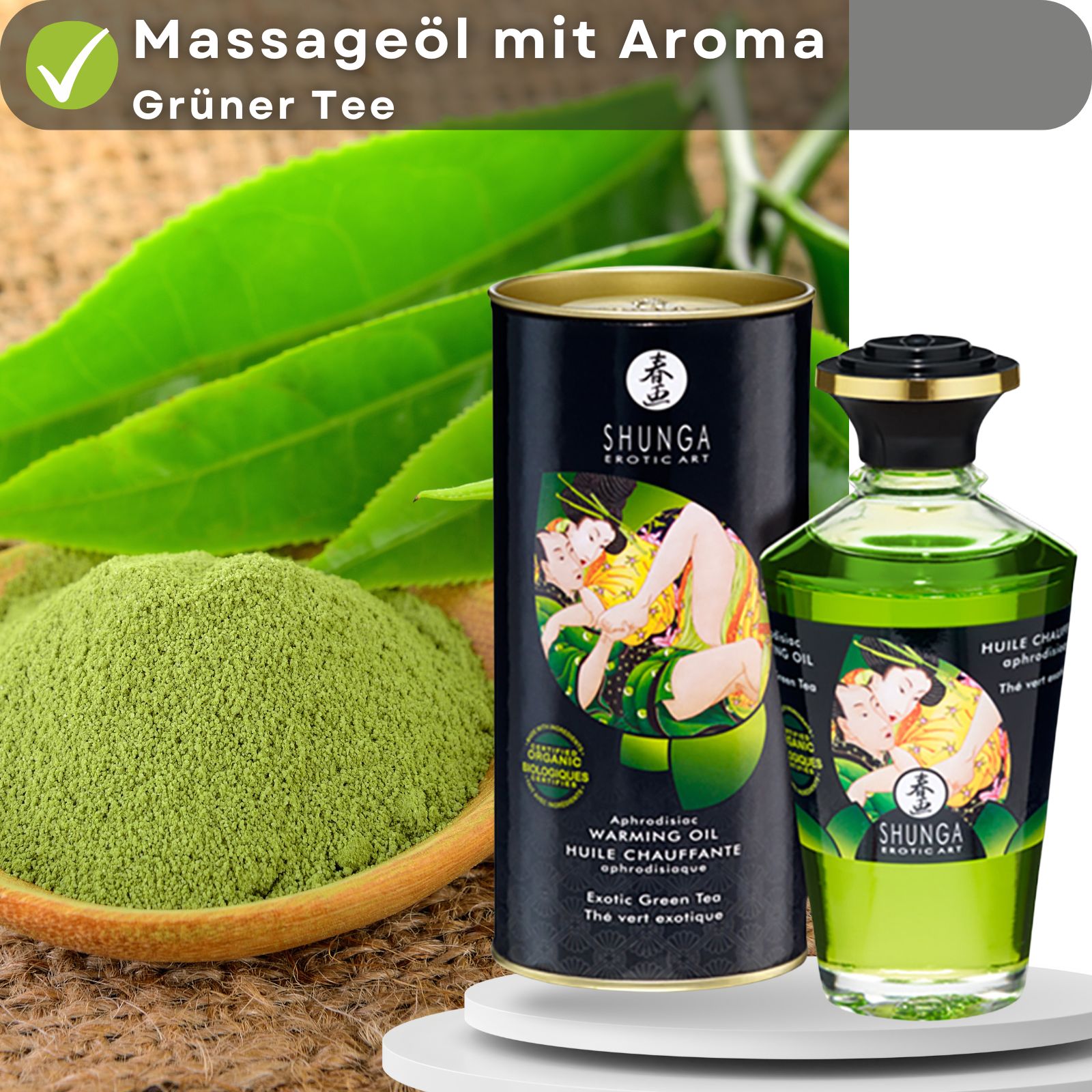 Massageöl mit Aroma Grüner Tee, Dose und Flasche. Aufschrift: Shunga Exotic Art. Grüner Tee-Blätter und Pulver auf Holz. Text auf grünem Feld.