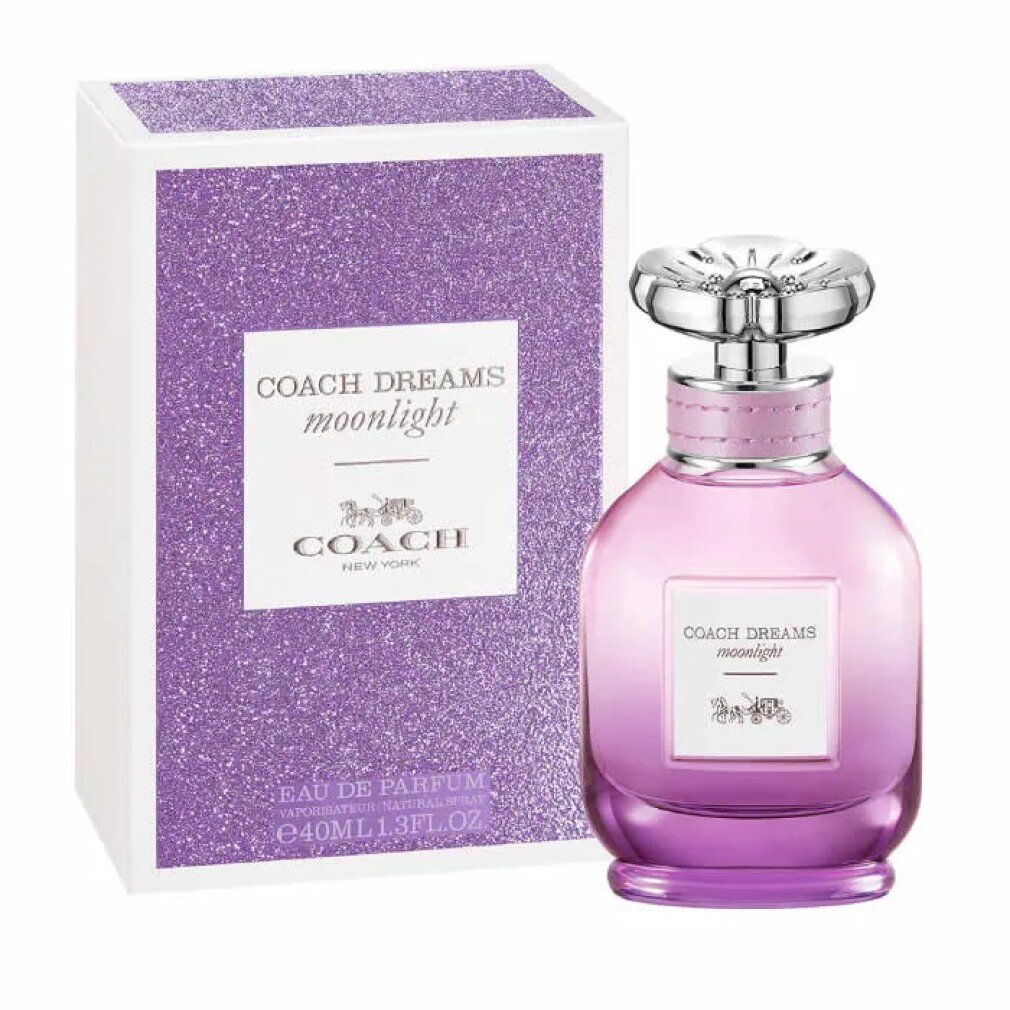 Flakon und Schachtel von Coach Dreams Moonlight. Flakon aus Glas, rosa-violett. Schachtel mit Glitzereffekt. Text: Coach, Dreams Moonlight.