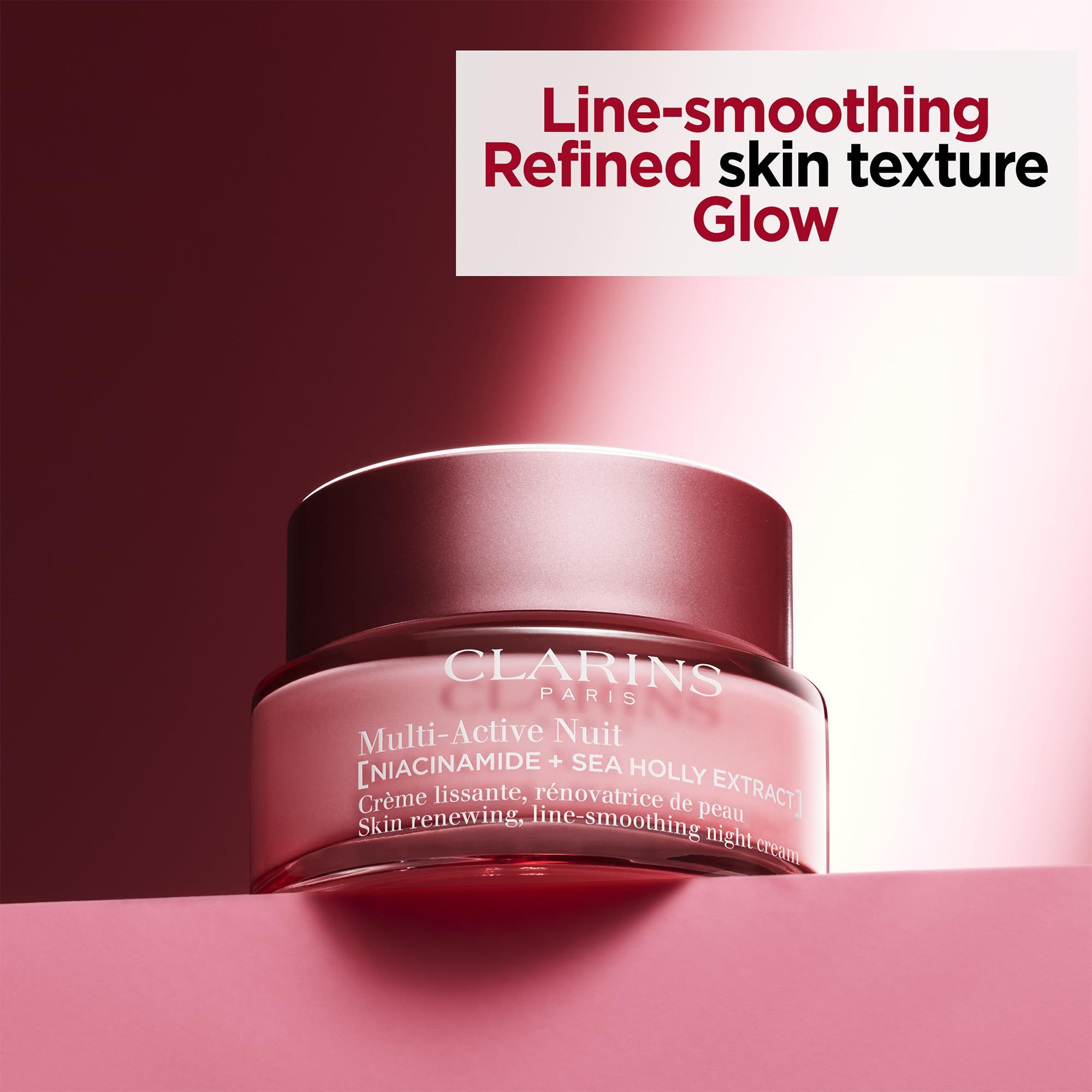 Rosa Tiegel vor rosa Hintergrund. Text: Clarins Paris, Multi-Active Nuit, Crème lissante, rénovatrice de peau. Text: Line-smoothing, Refined skin texture.