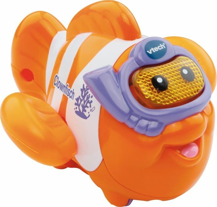 Orangefarbener Clownfisch mit weißem Bauchband und Taucherbrille. Auf dem Bauch steht "Clownfisch". Das Produkt hat das Logo von Vtech.