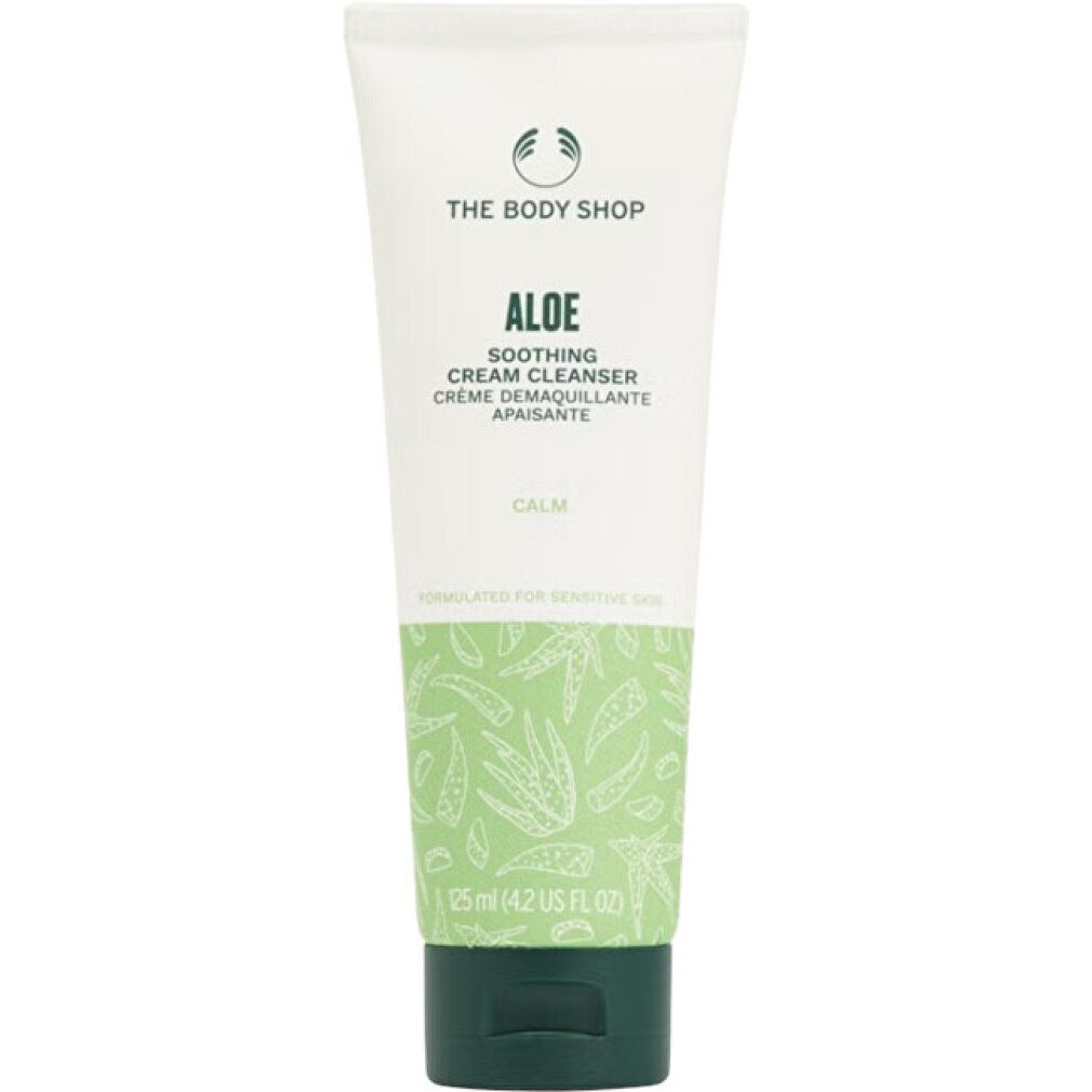 Creme-Reiniger-Tube. Weiß mit grünem Muster und Schriftzug 'ALOE'. Marke: The Body Shop. Für empfindliche Haut.