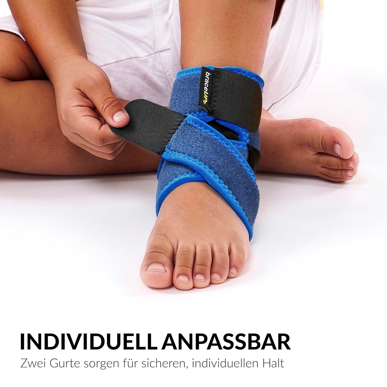 Rückansicht eines blauen Fußgelenk-Stützbandes mit offenem Fersenbereich.