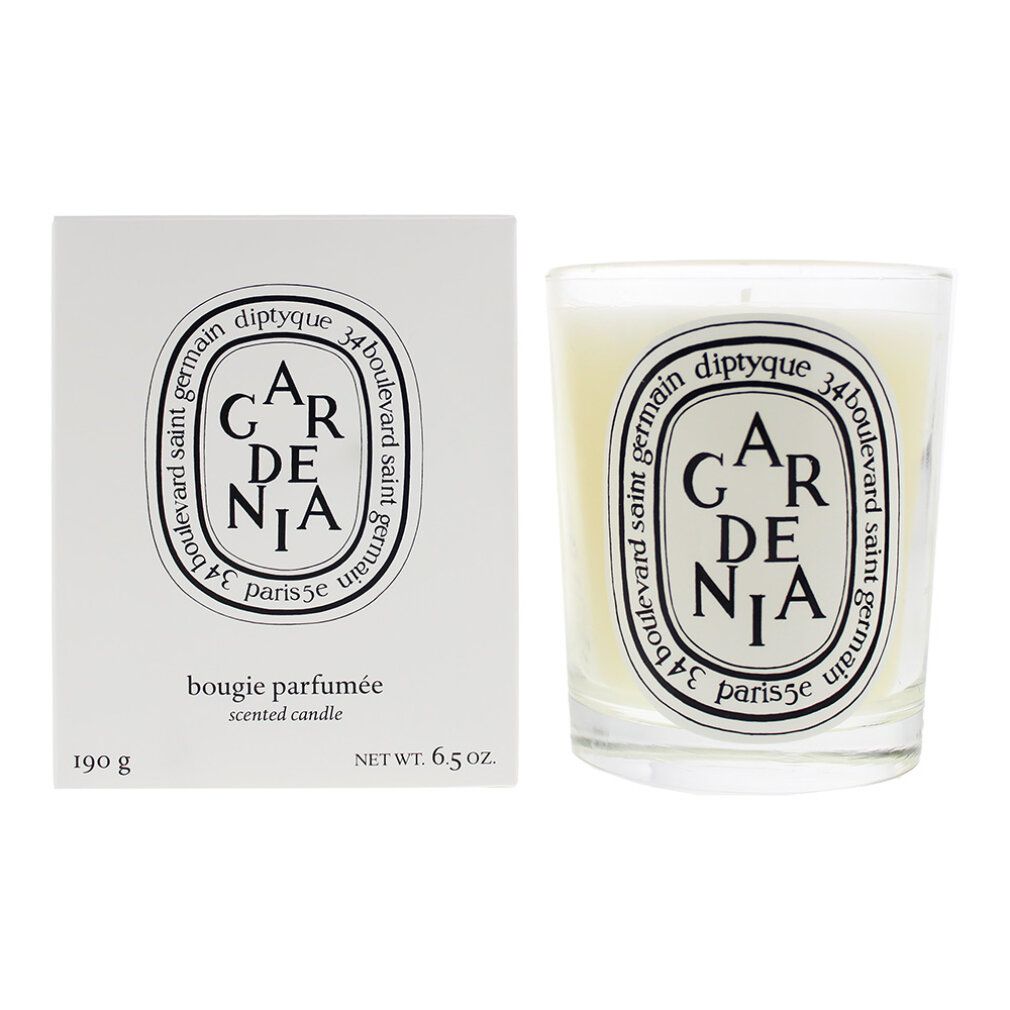 Kerze GARDENIA und Verpackung. Weiße Schachtel mit Logo und Text. Kerze im Glas, weißes Wachs.