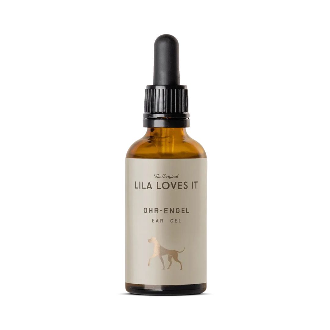 Braune Glasflasche mit Pipette. Etikett mit "LILA LOVES IT", "OHR-ENGEL" und Hund-Silhouette.