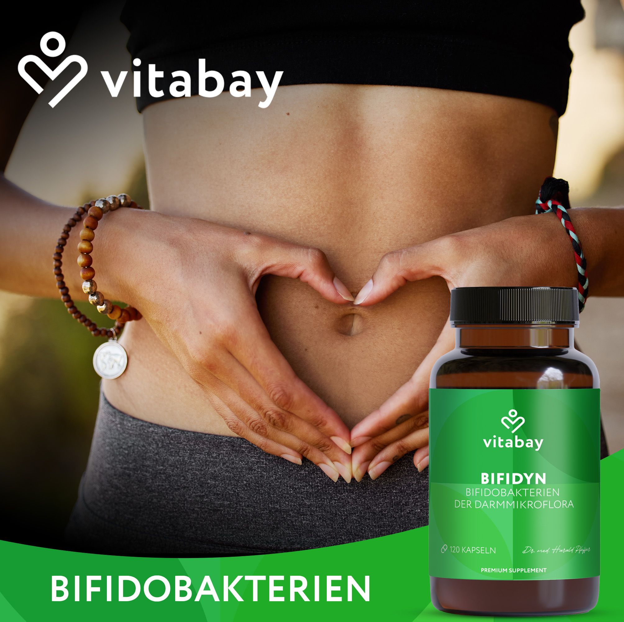 Person formt mit den Händen ein Herz vor dem Bauch. Braune Flasche mit grüner Beschriftung. Text: Bifidobakterien, 120 Kapseln.