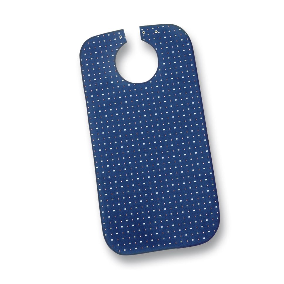 Blauer Latz mit weißen Punkten. Halsöffnung mit Druckknöpfen. Rechteckige Form mit abgerundeten Ecken. Aus Polyester.