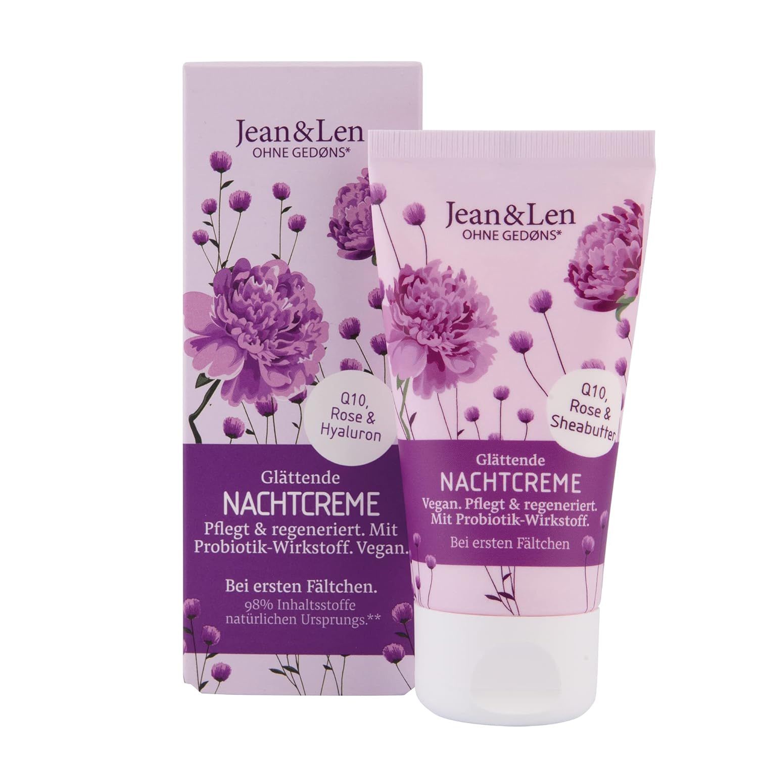 Creme-Tube und Verpackung. Aufschrift: Jean & Len, Glättende Nachtcreme, Q10, Rose & Hyaluron. Lila Blüten-Dekor.
