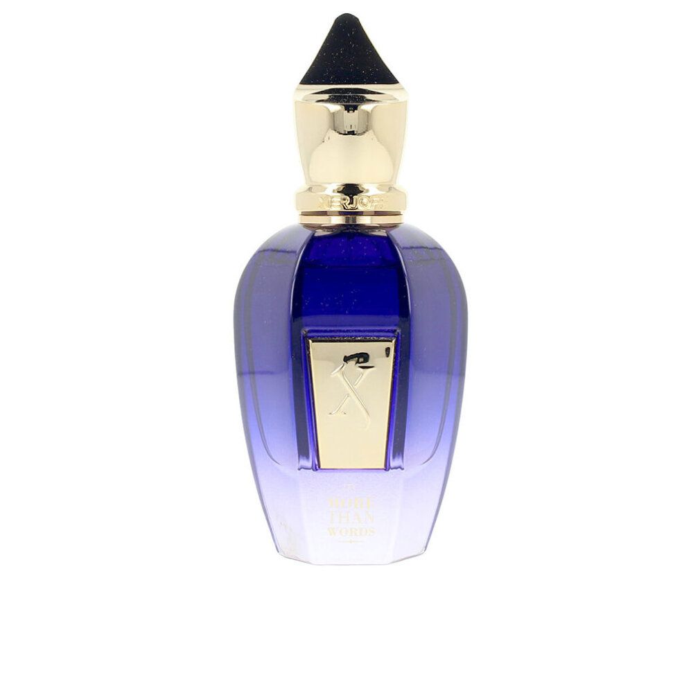 Blau-transparente Flasche mit goldenem Verschluss. Aufschrift "MORE THAN WORDS". Goldfarbenes "X"-Logo.
